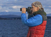 Michael Sargent focusing on Mt. Mansfield over Malletts Bay in Colchester.